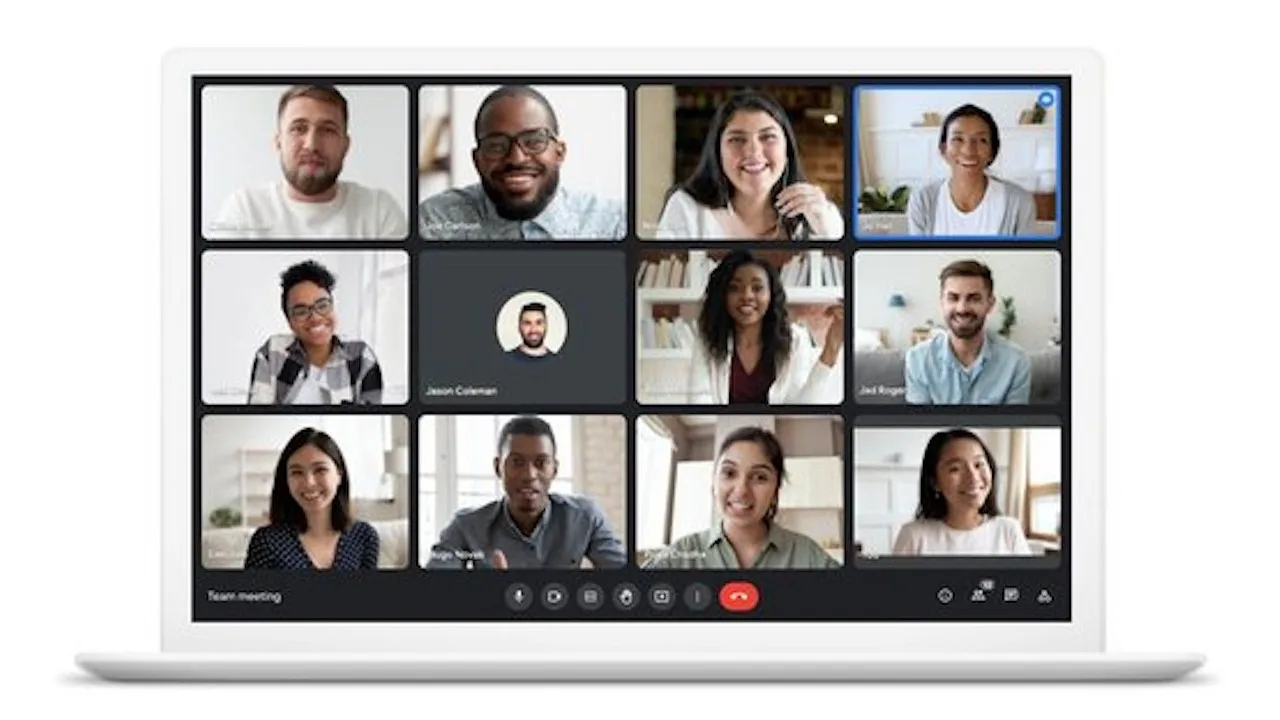 a group of people on a laptop